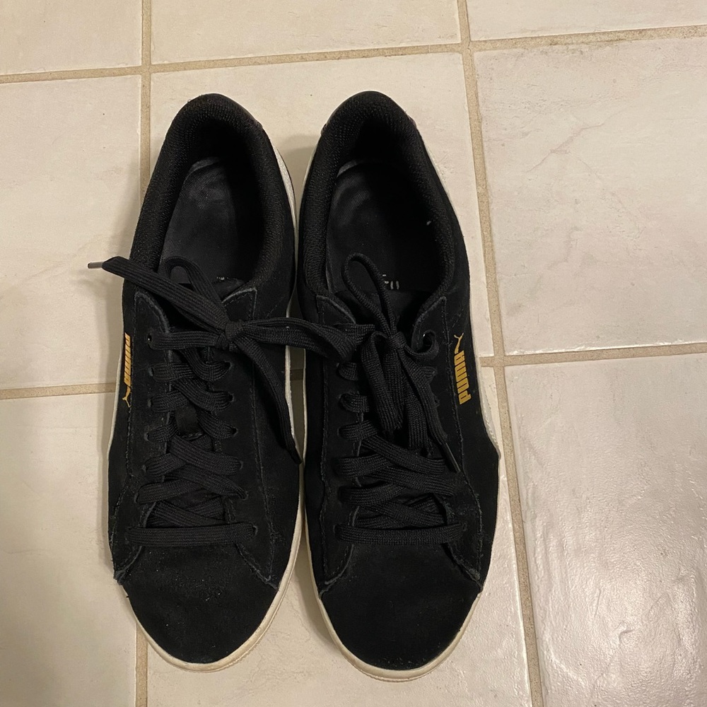 Puma Women’s Black and Gold Sneakers